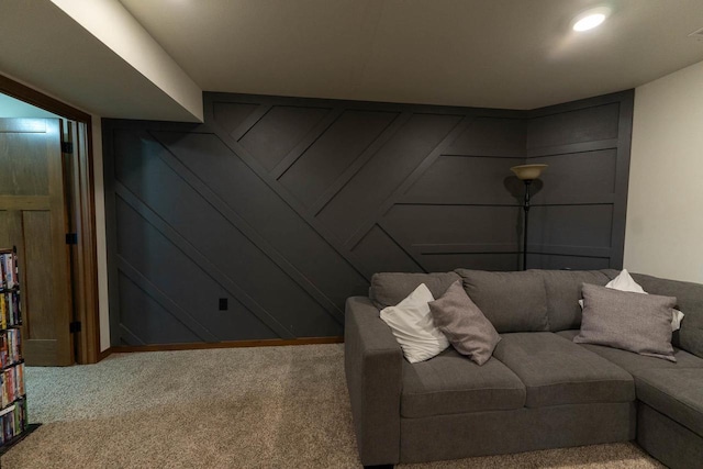 351 Alyssa St, Tomah, WI 54660 - carpeted living area featuring a decorative wall