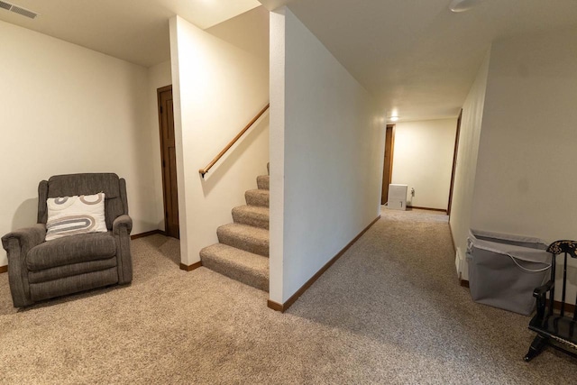 351 Alyssa St, Tomah, WI 54660 - interior space featuring stairs, baseboards, visible vents, and carpet