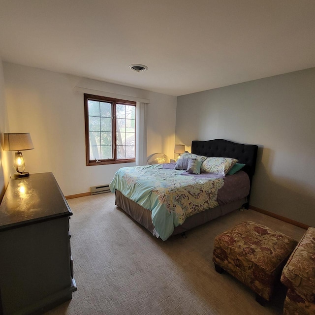 carpeted bedroom with baseboards, visible vents, and baseboard heating