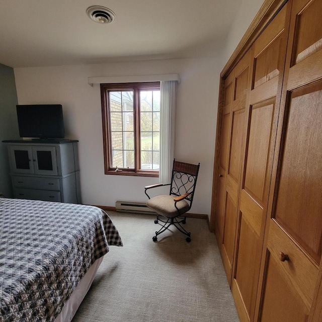bedroom featuring light carpet and visible vents