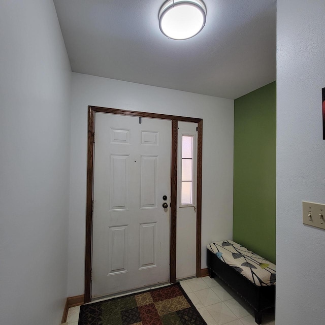 entrance foyer with baseboards