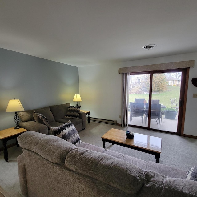 carpeted living area with baseboards, a baseboard heating unit, and visible vents