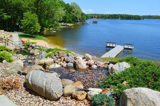 view of dock with a water view