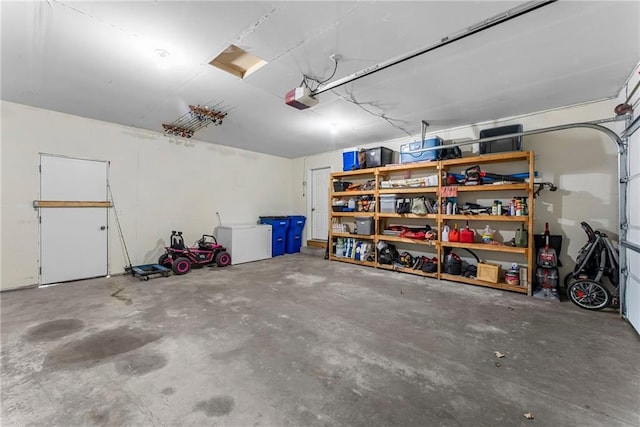 garage featuring a garage door opener