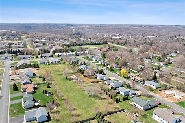 birds eye view of property with a residential view
