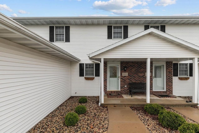 entrance to property with covered porch