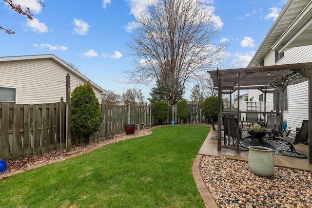 view of yard featuring a fenced backyard, a pergola, and a patio