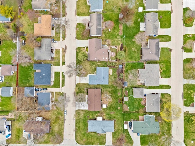 birds eye view of property with a residential view