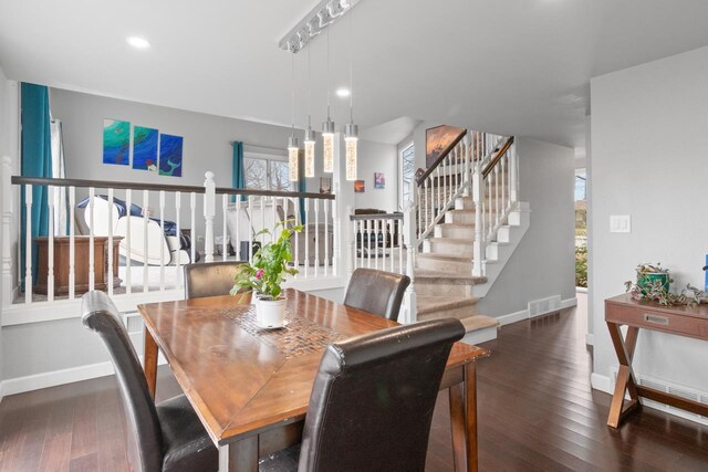 1755 Carmen Ave, Sheboygan, WI 53081 - dining space featuring stairs, recessed lighting, baseboards, visible vents, and hardwood / wood-style flooring