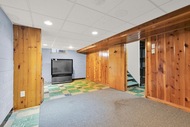 3317 E Denton Ave, Saint Francis, WI 53235 - finished basement featuring a drop ceiling, stairway, wooden walls, recessed lighting, and tile patterned floors