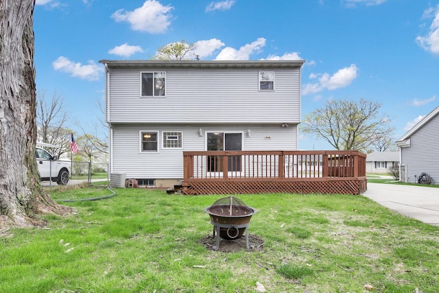 3317 E Denton Ave, Saint Francis, WI 53235 - back of house featuring a fire pit, a wooden deck, and central air condition unit