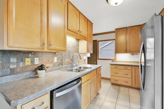 3317 E Denton Ave, Saint Francis, WI 53235 - kitchen featuring stainless steel appliances, a sink, tasteful backsplash, light tile patterned floors, and baseboards