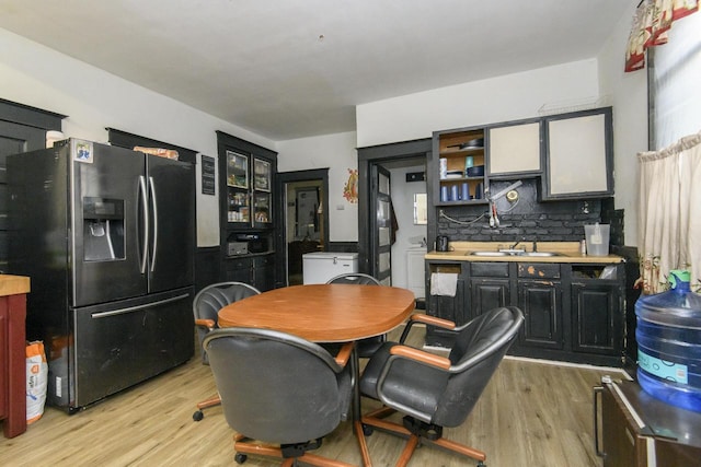 dining area featuring light wood-type flooring