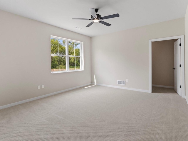 W194N16740 Eagle Dr Unit 1, Jackson, WI 53037 - empty room with a ceiling fan and light colored carpet