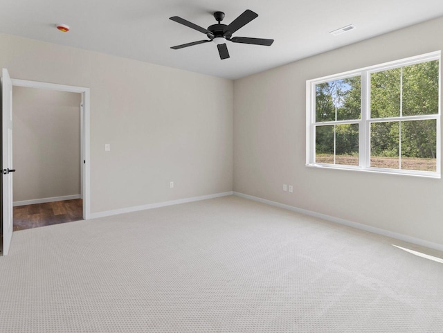 W194N16740 Eagle Dr Unit 1, Jackson, WI 53037 - empty room featuring light colored carpet and ceiling fan