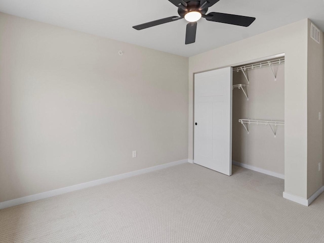 W194N16740 Eagle Dr Unit 1, Jackson, WI 53037 - unfurnished bedroom featuring light colored carpet, a closet, and a ceiling fan