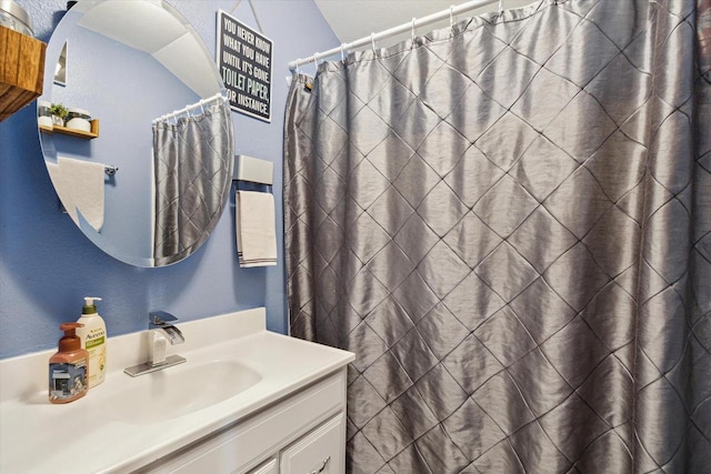 full bath featuring vanity