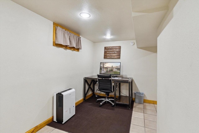 home office with baseboards, recessed lighting, and tile patterned floors