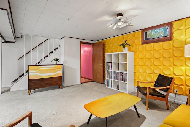 632 N Harrison St, Stoughton, WI 53589 - sitting room with carpet flooring, ceiling fan, stairs, and baseboards