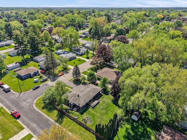 632 N Harrison St, Stoughton, WI 53589 - aerial view of residential area with a heavily wooded area