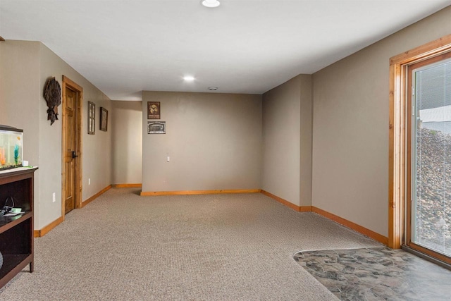 interior space featuring baseboards and recessed lighting