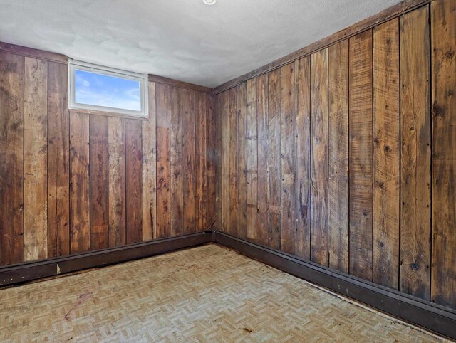 empty room with wood walls