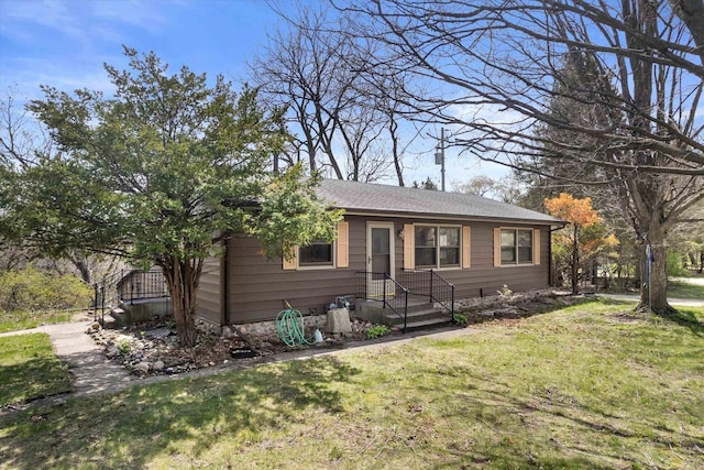 view of front of property with a front lawn