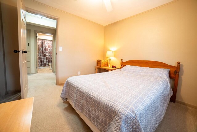 712 Frank St, Darlington, WI 53530 - bedroom featuring light colored carpet, baseboards, and ceiling fan