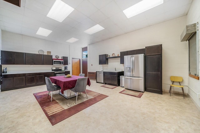510 Lake St, Cascade, WI 53011 - dining space with visible vents, a paneled ceiling, and light floors