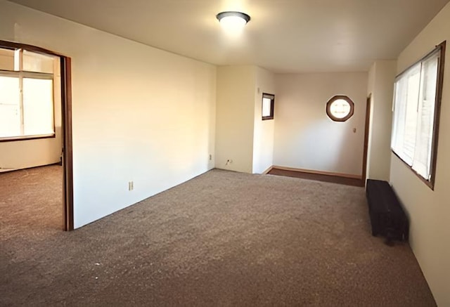 spare room featuring carpet flooring