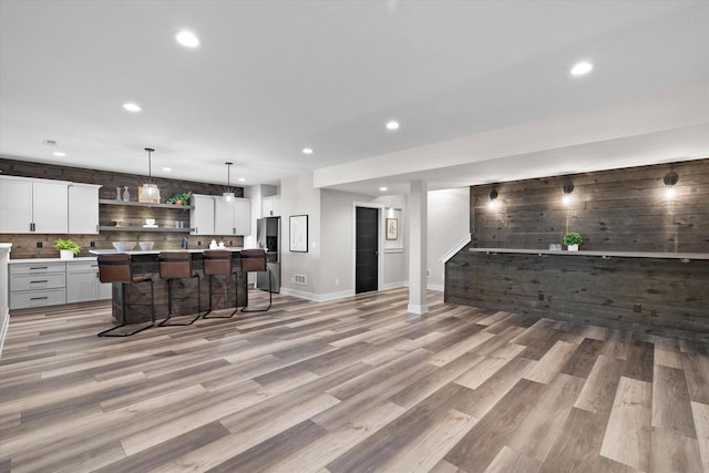 N59W27328 Autumn Ct, Lisbon, WI 53089 - kitchen with recessed lighting, open floor plan, and stainless steel fridge with ice dispenser