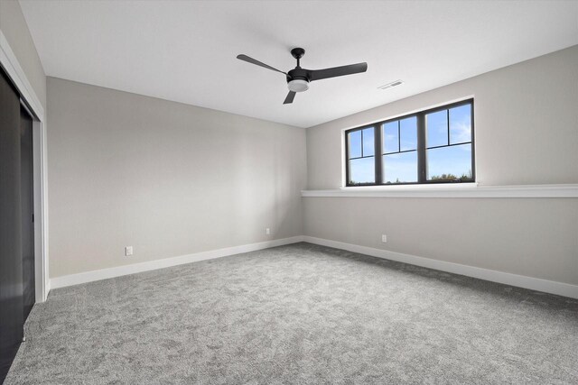 N59W27328 Autumn Ct, Lisbon, WI 53089 - carpeted spare room featuring baseboards, a ceiling fan, and visible vents