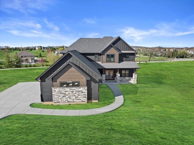 N59W27328 Autumn Ct, Lisbon, WI 53089 - craftsman-style home with french doors, board and batten siding, stone siding, and a front yard