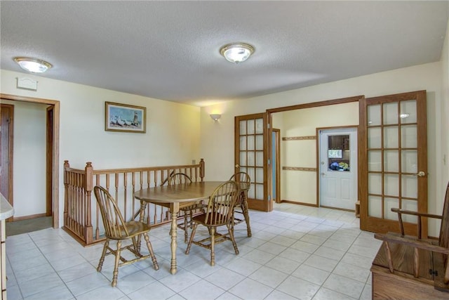 1897 Breezy Bay Rd, Balsam Lake, WI 54810 - dining space with french doors and a textured ceiling