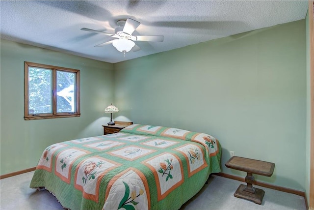 1897 Breezy Bay Rd, Balsam Lake, WI 54810 - bedroom with a textured ceiling, baseboards, ceiling fan, and carpet