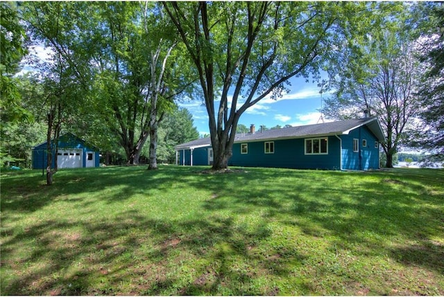 1897 Breezy Bay Rd, Balsam Lake, WI 54810 - view of yard featuring a detached garage and an outdoor structure