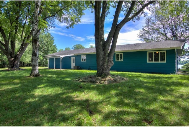 1897 Breezy Bay Rd, Balsam Lake, WI 54810 - view of front of property featuring central AC and a front lawn