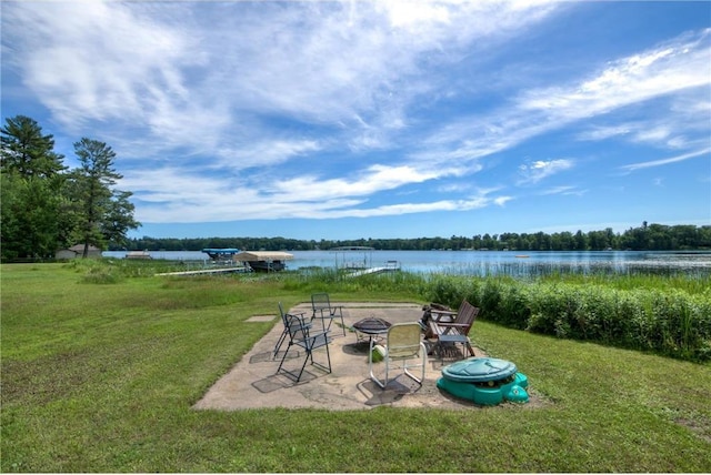 1897 Breezy Bay Rd, Balsam Lake, WI 54810 - view of yard with a water view, a fire pit, and a patio area