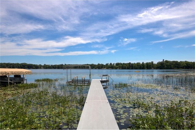 1897 Breezy Bay Rd, Balsam Lake, WI 54810 - view of dock featuring a water view and a view of trees