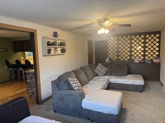 266 Forest St, Berlin, WI 54926 - living area featuring baseboards, carpet, and a ceiling fan