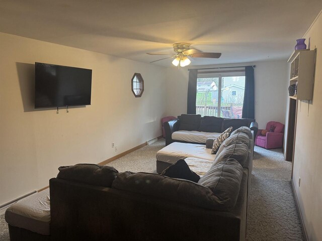 266 Forest St, Berlin, WI 54926 - living area featuring baseboard heating, baseboards, ceiling fan, and carpet