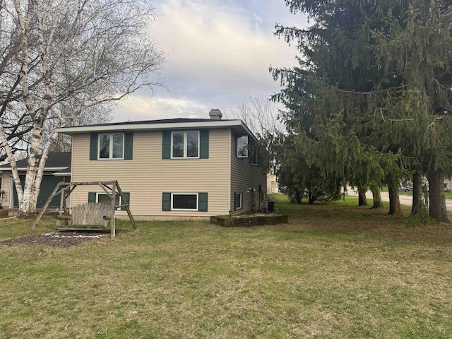 266 Forest St, Berlin, WI 54926 - rear view of house with a lawn