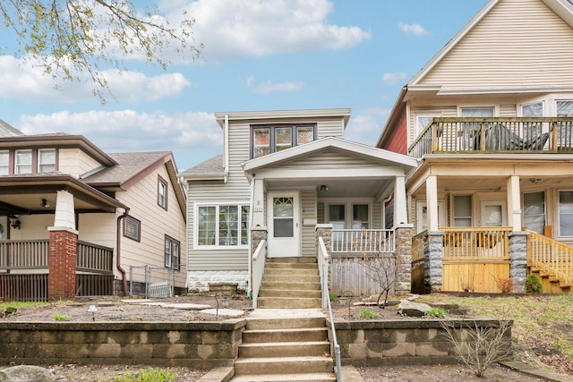 3025 W Pierce St, Milwaukee, WI 53215 - view of front of property with a porch and stairway