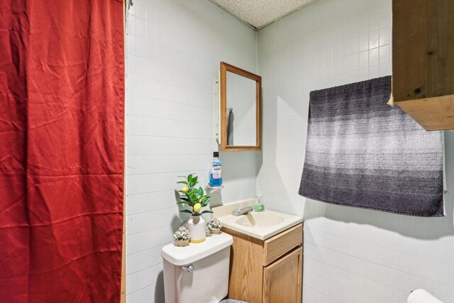 3025 W Pierce St, Milwaukee, WI 53215 - bathroom featuring vanity and toilet