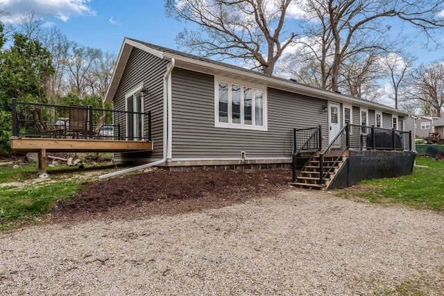 1729 E Rd 5, Milton, WI 53534 - exterior space with stairs and a deck