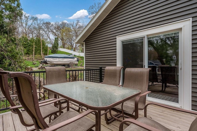 1729 E Rd 5, Milton, WI 53534 - wooden terrace featuring outdoor dining space
