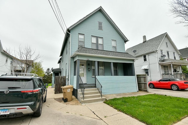 traditional-style home with covered porch