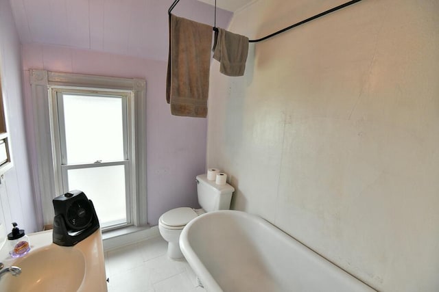 full bath with tile patterned flooring, a bathing tub, a shower, and toilet