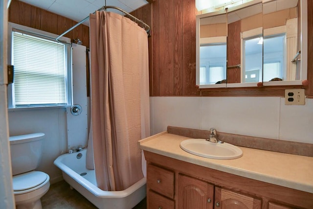 bathroom with vanity, toilet, a shower with curtain, and a washtub