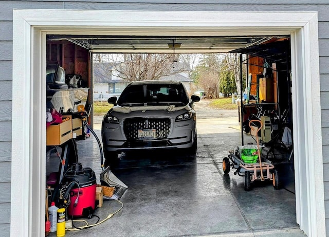 556 Gold St, Green Lake, WI 54941 - garage featuring concrete driveway